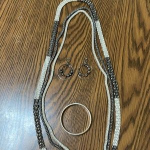 Bundled necklace, bracelet, and earrings